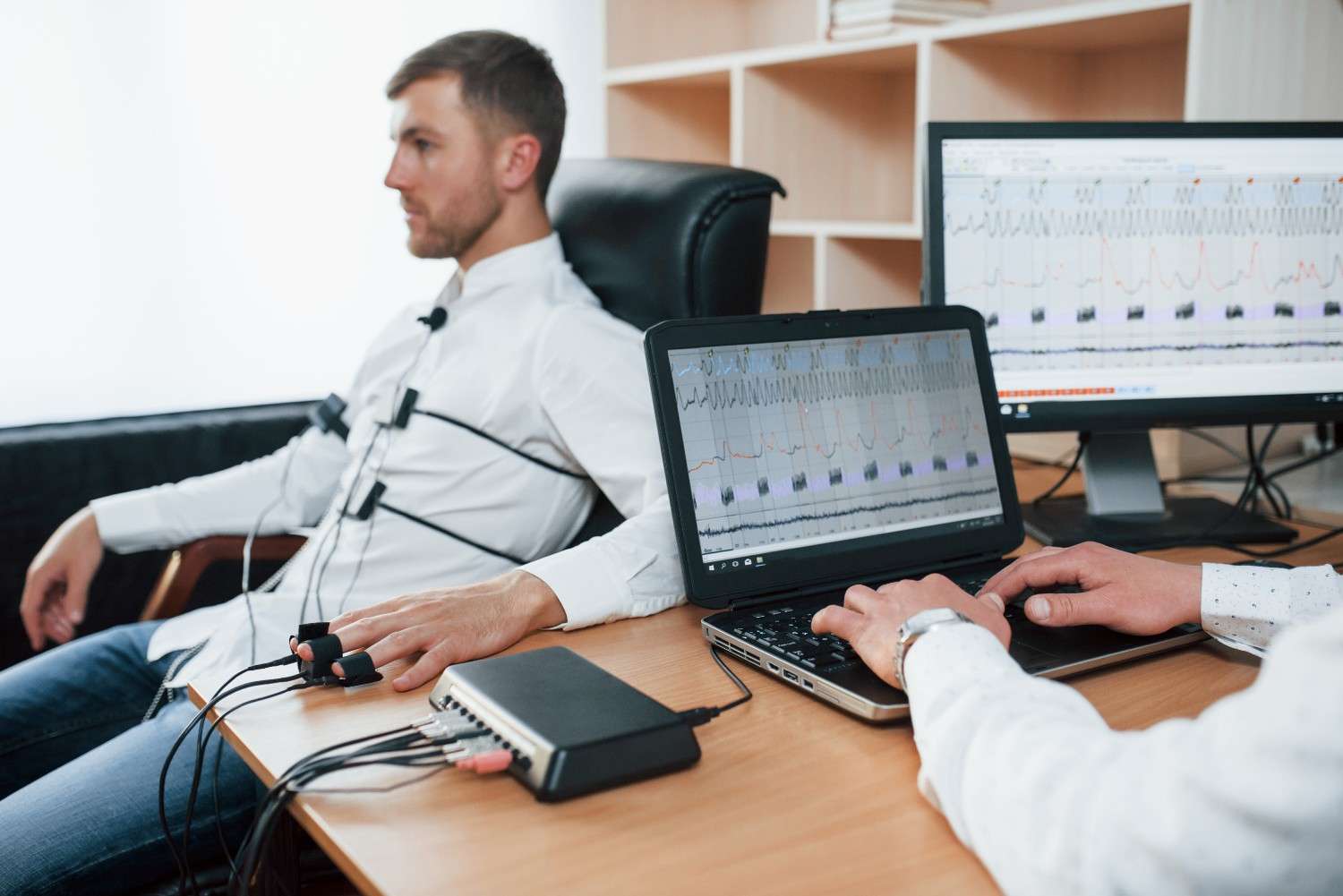 tense-look-suspicious-man-passes-lie-detector-office-asking-questions-polygraph-test