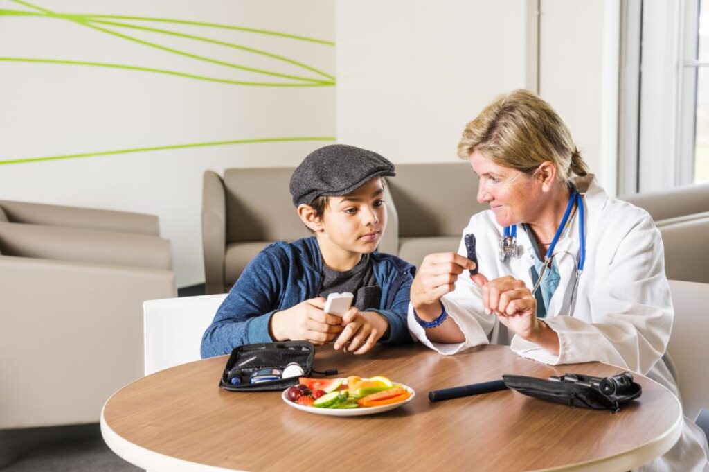 Doctor talking with children