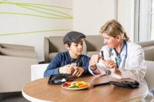 Doctor talking with children