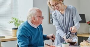 Old man and girl take care