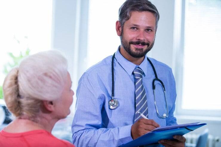 Doctor smiling at the child